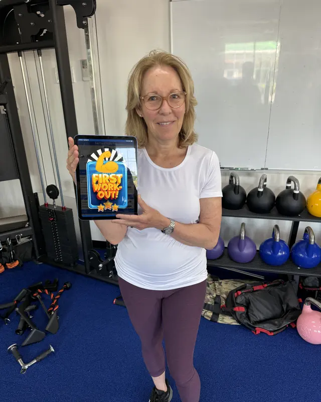 A Fravola Fitness member celebrating their first workout